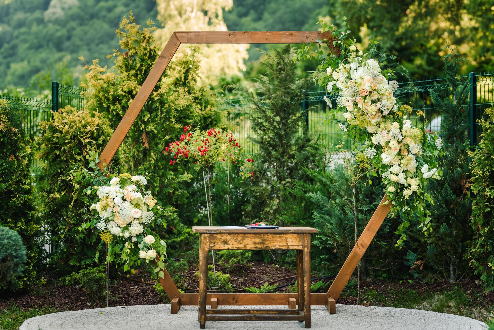 Boho decorated wedding arch.